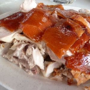 Lechon Asado, arroz con gandules y yuca al mojo